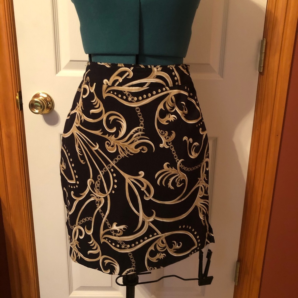 Women’s black and gold golf skirt